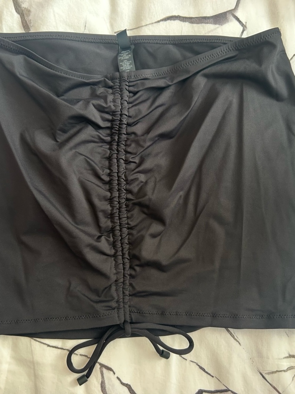 SKIMS Black Ruched Mini Skirt